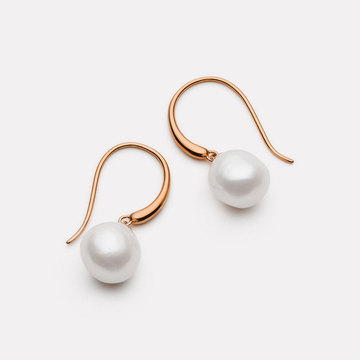 Najo Ocean Glow Pearl Earrings - Rose Gold
