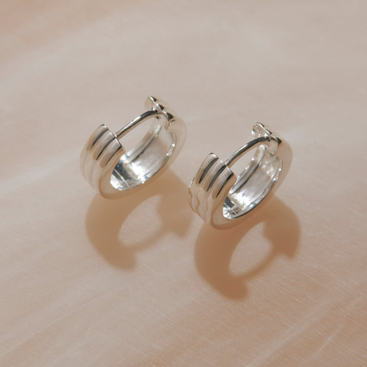 Najo Carrousel Huggie Earrings - Sterling Silver