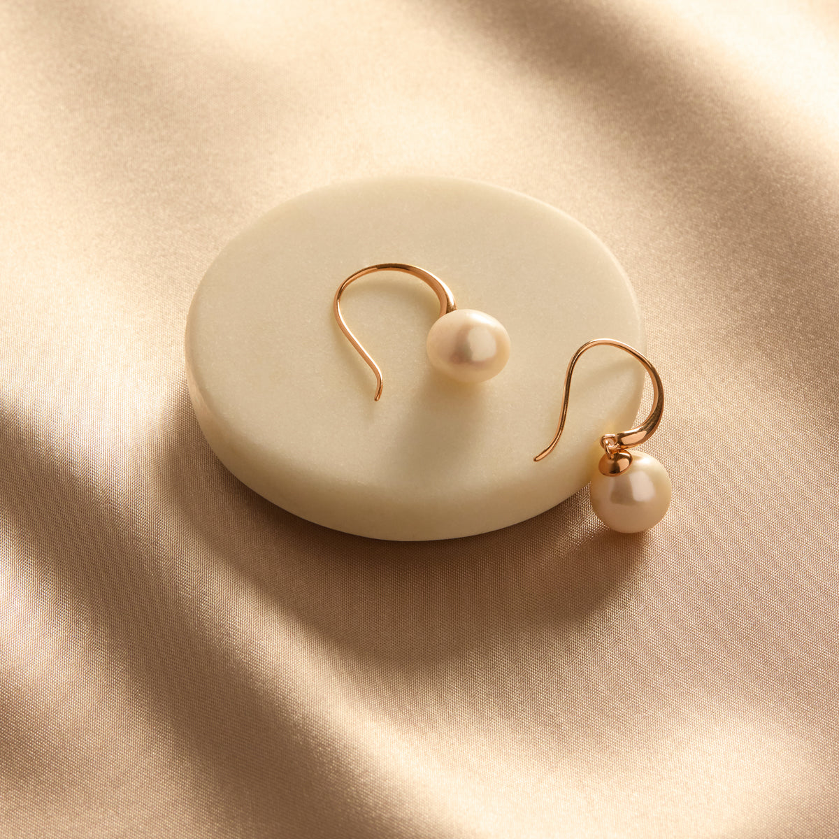 Najo Ocean Glow Pearl Earrings - Rose Gold